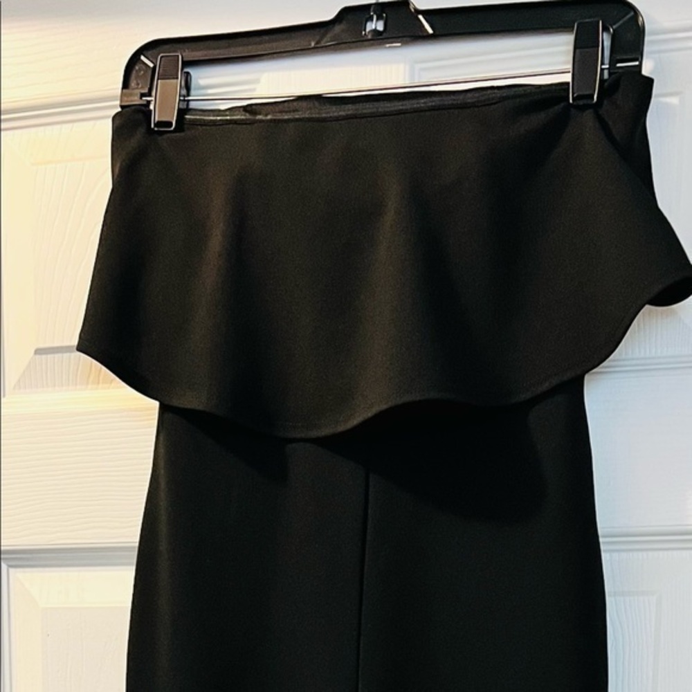 Pant suit by Crystal Sky black strapless one piece jumpsuit with ruffle to
